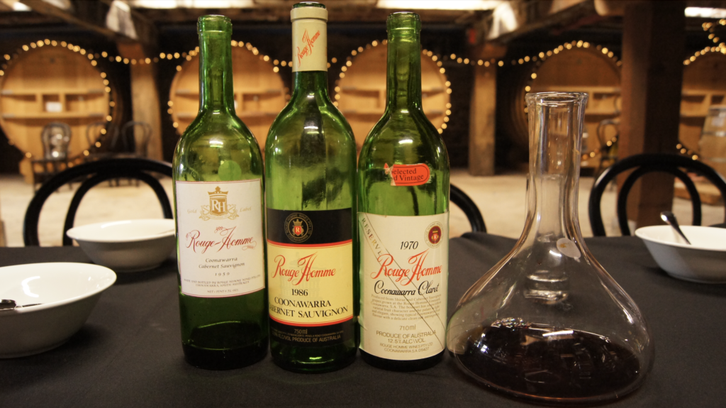 Bottles of Rouge Homme opened on a table